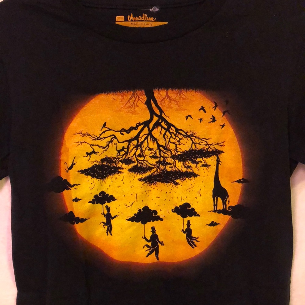 1st Edition “Sees the Day” whimsical sunset tee